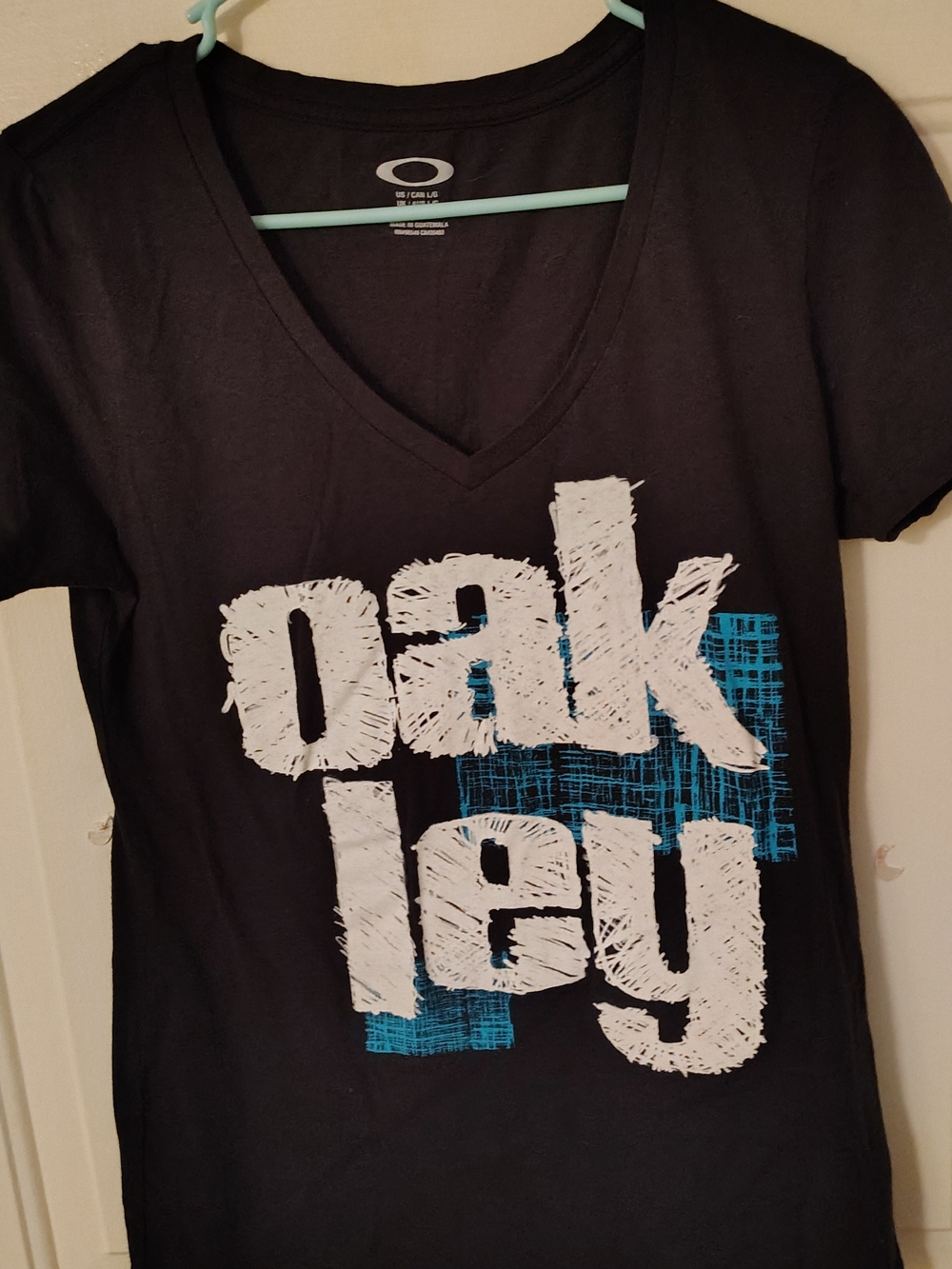 Oakley Black Graphic V-Neck Tee with Blue & White Print